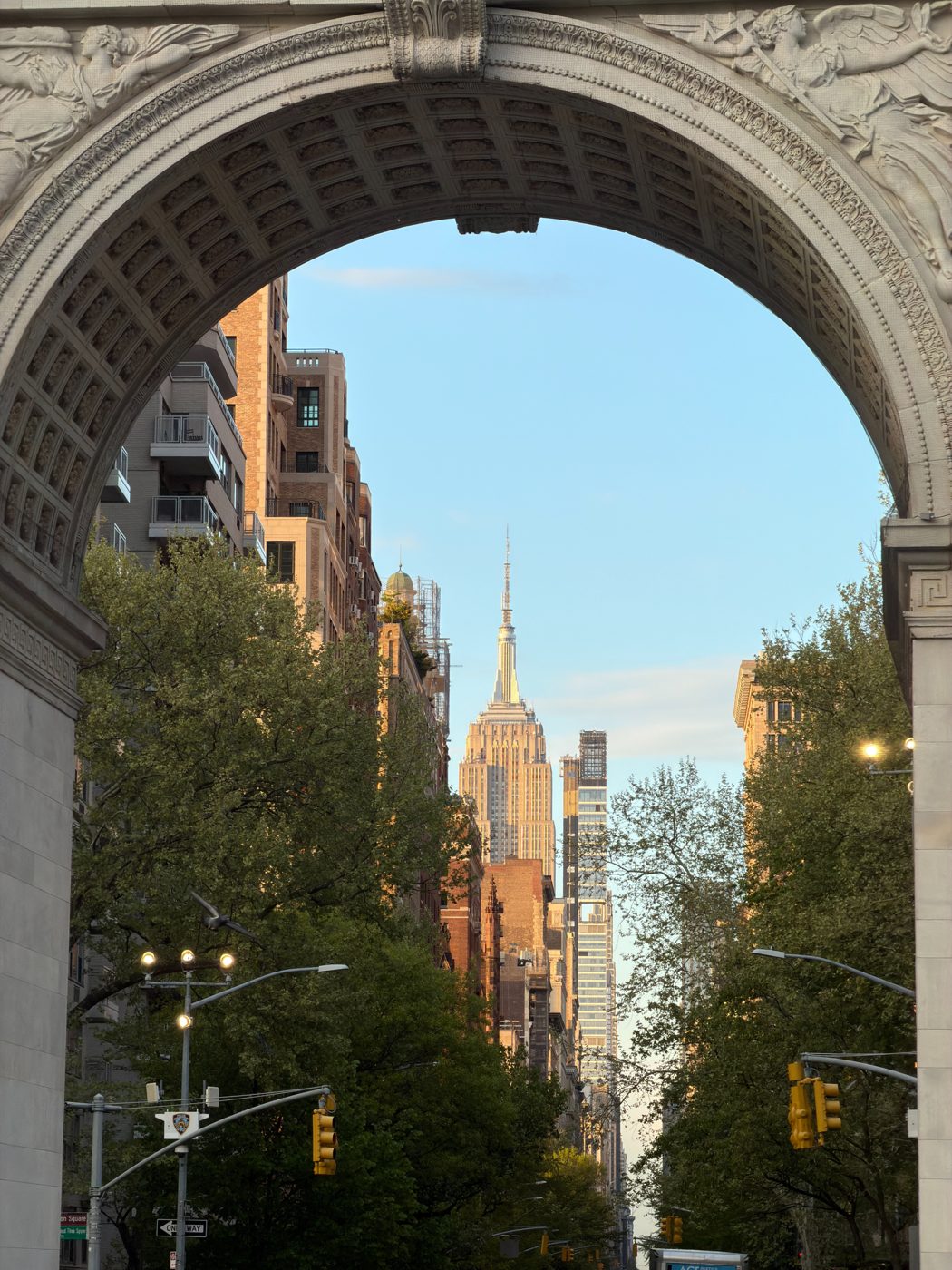 The Empire State Building framed by the Washington Square Arch